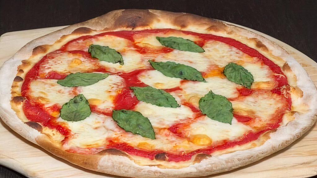 The Margherita Pizza · White pizza, sliced tomatoes, fresh mozzarella, and basil.