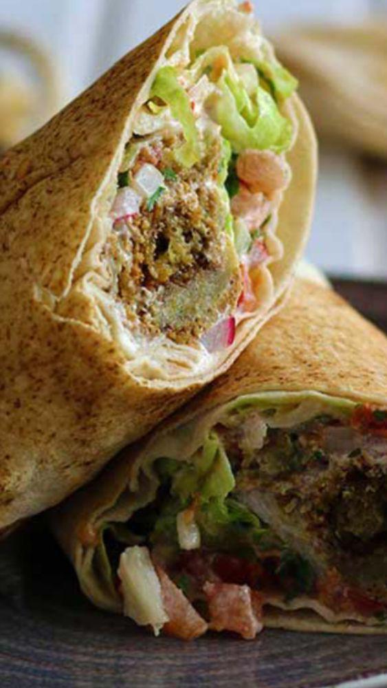 Falafel Wrap · A house favorite featuring sunflower sesame falafel with hummus and veggies.