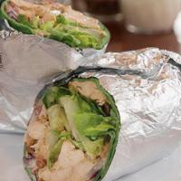 California Club Wrap · Grilled chicken, bacon, romaine lettuce, sliced tomatoes, red onions, muenster, and ranch dr...