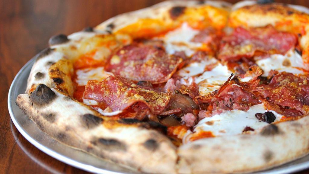 Small Carnivore Pizza

 · A4 Mozzarella, tomato, sopressata, sausage, and bacon.