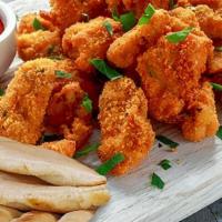 Chick-N-Sticks · Breaded chicken breast cubes served with a pita and a side of yerroh pink sauce or homemade ...