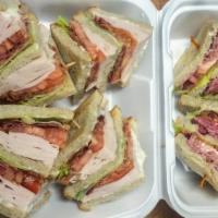 Turkey, Roast Beef, Corned Beef, Ham Clubs · Bacon, lettuce, and tomato on three layers.