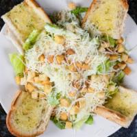 Caesar Salad · Romaine lettuce, garlic croutons, shredded imported Parmigiano cheese tossed with our house ...