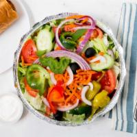 Garden Salad · Iceberg lettuce, tomatoes, cucumbers, onions, black olives, bell peppers, and shredded carro...