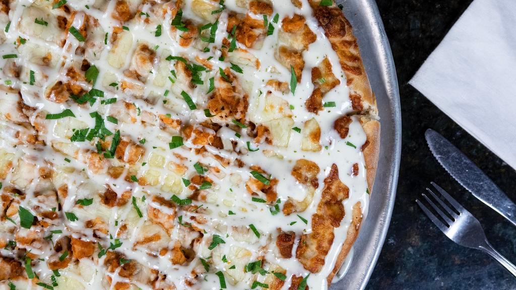 Buffalo Chicken & Ranch Pizza · Crispy buffalo chicken, crumbled blue cheese, mozzarella and drizzled with ranch dressing.