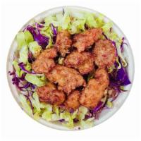 Fried Chicken Bowl 🌶 · double fried chicken, cucumber, red cabbage, romaine lettuce, chili powder & sesame seeds wi...