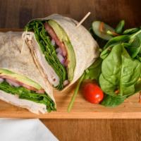 Turkey Avocado Wrap · Oven gold turkey, avocado, lettuce, tomatoes and onions.