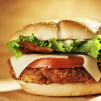 Fried Chicken Sandwich · Fried crispy boneless chicken breast with lettuce topped with two buns.