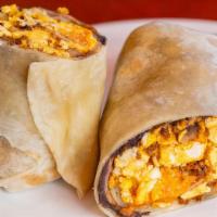 Breakfast Burrito With Meat · Flour tortilla filled with scrambled eggs, cheese, refried beans, home fries, and our delici...