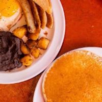 Pancake Meal Plate · 2 Eggs, home fries, toast, 2 pancakes and with choice of ham, bacon, chorizo or sausage.