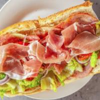The South Philly Sub · Prosciutto ham, Capicola, imported salami and aged provolone, lettuce, tomato and onion.