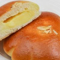 Custard Bun · Sweet bun with custard cream filling. Contains: Egg, Wheat, Milk, Tree Nut(almond), and Soy