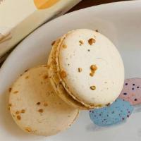 Hazelnut Brittle Macaron · INGREDIENTS: Cane Sugar, Almond Flour, Cage Free Eggs, Whipping Cream, Butter (Pasteurized C...