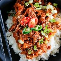 Spicy Pork Over Rice · Pork and vegetables w/ Korean spicy sauce over rice