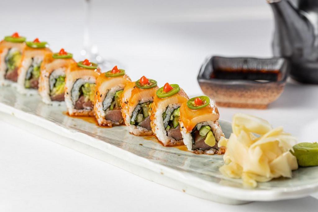 Honshu (Hon-Shu) Roll · 8 piece. Tuna, cucumber, & Avocado. topped w/ Hamachi(yellowtail)  Togarahsi & Serrano. Poke Sauce (sesame, sambal, soy)