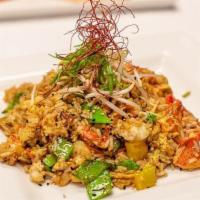 Lobster Fried Rice · Snow Peas, Fresno, Carrots, Red & Yellow Peppers, Egg, Smoked Soy Glaze