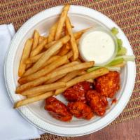 5 Pc. Boneless Wings Combo · With fries and soda can.