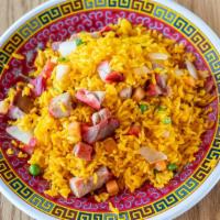 Roast Pork Fried Rice · Stir-fried rice with mild sweet meat that has been roasted.