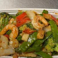 Seafood With Szechuan Style · Lobster meat, shrimp, scallops with mixed vegetables in szechuan and hot pepper sauce.