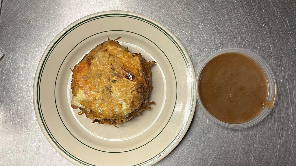 Roast Pork Egg Foo Young · Omelette with mild sweet meat that has been roasted.