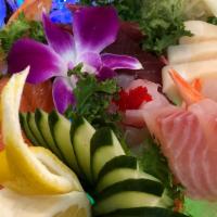 Sashimi Deluxe · Assorted 19 pieces of fresh raw fish.