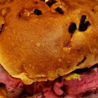 Super Roast Beef (Onion Roll) · 9 oz of our Famous Hot Roast Beef served on a Fresh Onion Roll with you choice of toppings.