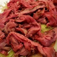 Super Pastrami · Super Pastrami Sandwich served on your choice of a Seeded Sesame Roll or an Onion Roll  with...