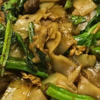 Pad See Ew · Stir fried flat rice noodle with egg and Chinese broccoli in sweet black soy sauce.