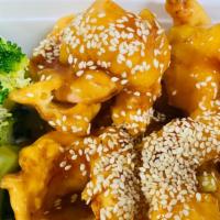 Crispy Sesame Chicken · Tender chunks of white meat chicken made crispy, and coated in a sweet sauce with sesame see...