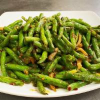 Sautéed String Beans · Served with steamed rice.