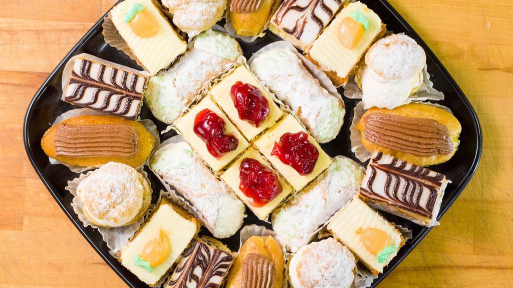 Mini Pastry - 2 Dozen Tray · Assorted 4 of each mini pastry, no substitutions on a decorative tray.