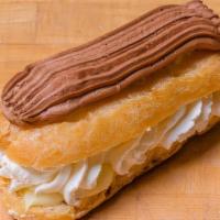 French Eclair · Puff pastry filled with creamy Italian custard and homemade fresh whipped cream topped with ...