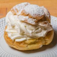 Cream Puff · Puff pastry filled with custard and homemade whipped cream.