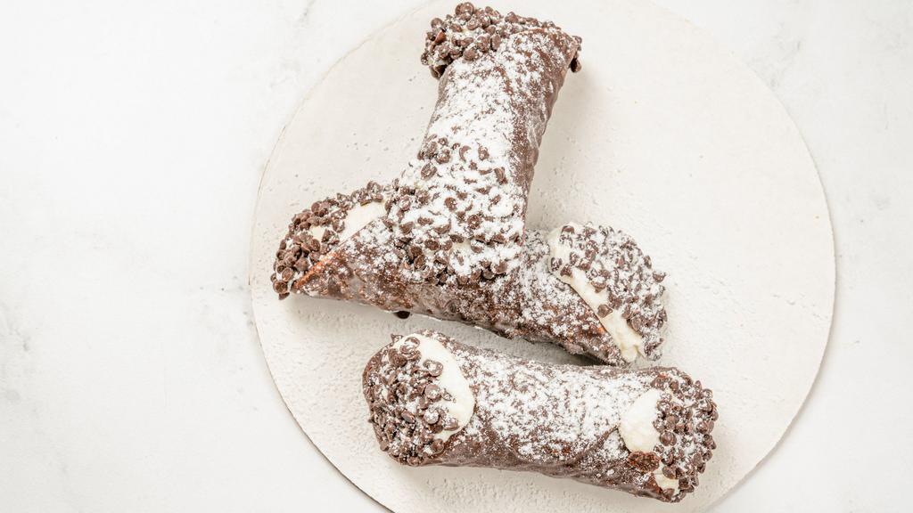 Large Chocolate Dipped Cannoli · Large chocolate dipped cannoli shell filled with fresh homemade ricotta, sprinkled with chocolate chips.