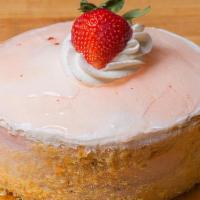 Strawberry Mousse Torte · Sponge cake layered with strawberry mousse and whipped cream, topped with strawberry glaze.