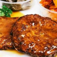 Salisbury Steak · Seasoned ground beef gets shaped into steak-like patties, browned, and then braised in a ric...
