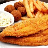 Fried Catfish · Crispy fried catfish fillet served with two side dishes and choice of bread on the side. We ...