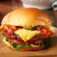 Cheeseburger · 1/2LB. Fresh brisket angus ground beef patty and melted double American cheese on a toasted ...