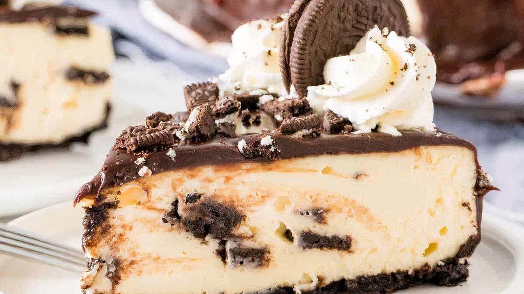 Oreo Cheesecake · This oreo cheesecake is thick, creamy and filled with cookies and cream