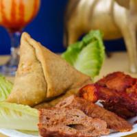 Non-Vegetable Assorted · Combination platter consists of seek kabob, malai kabab, meat samosa, and tandoori chicken.