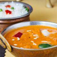 Paneer Tikka Masala · Homemade cottage cheese cubes cooked in a clay oven with green peppers and onions in a rich ...