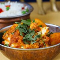 Aloo Gobi · Garden fresh florest of cauliflower and potato cooked along with fresh herbs and spices.