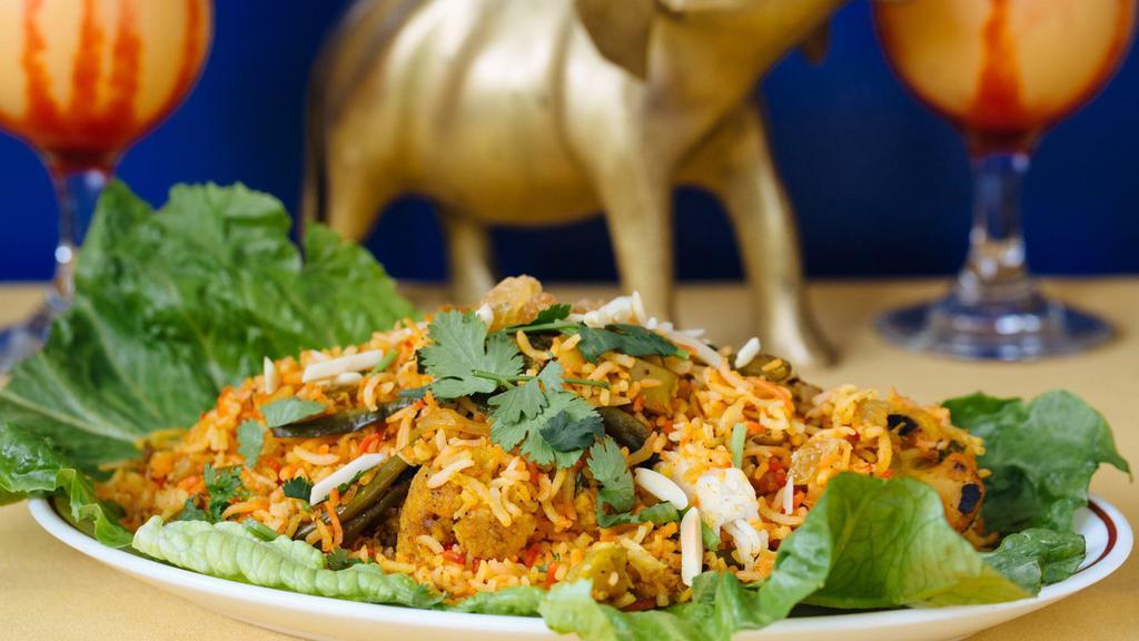 Vegetable Biryani · Indian basmati rice cooked with mixed vegetables and herbs and spices.