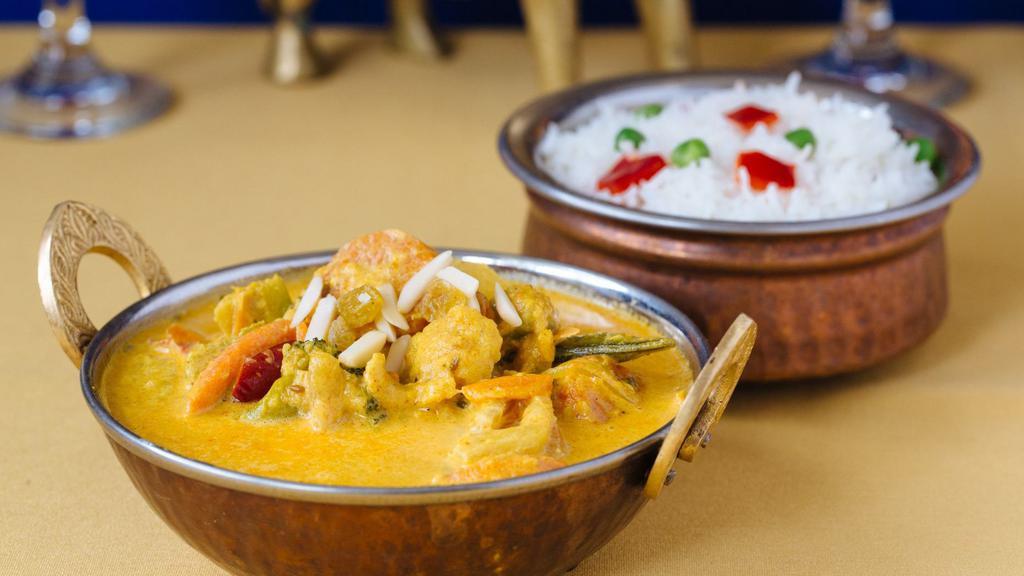 Chicken Shahi Korma · Sweet and spicy sauce with cashews and raisins.