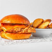Kids Crispy Chicken Sandwich · crispy chicken breast on a brioche bun with no sauces or condiments, served with a side of f...