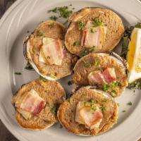 Baked Stuffed Clams · Five shells stuffed with fresh New England clams, topped with crackers, walnuts, crisp bacon...