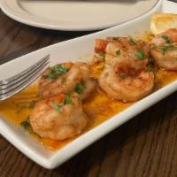 Phoenician Shrimp · Five jumbo shrimp, sautéed with garlic butter and paprika.