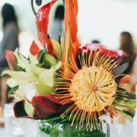 Small Tropical Arrangement · Bring your loved one a whole tropical moment by sending them this lush arrangement in a leaf...