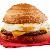 Sausage Egg N' Cheese Croissant  · Fresh cracked egg, Jimmy Dean® Country Sausage and melted American cheese on a croissant roll
