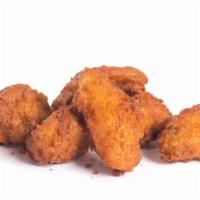 Snack Size Spicy Bone-In Wings  · Classic, meaty bone-in wings with a mildly spicy and peppery breaded crunch